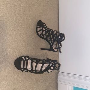 These shoes have been worn once. Size 6.5. They are in great condition!